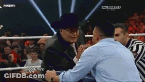Cowboy Hat Man Shaking Hands In Wrestling Ring GIF