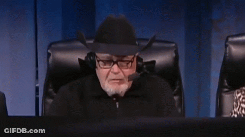 Cowboy Hat Man Talking To Suit Man GIF
