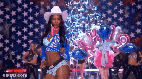 Cowboy Hat Woman Dancing On Stage With Balloons GIF
