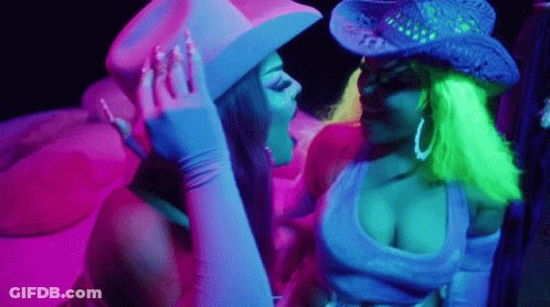 Cowboy Hat Woman Kissing Neon Wig Woman GIF