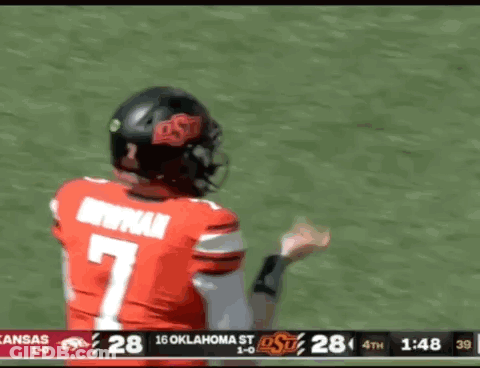 Cowboy In Orange Hat And Orange Pants GIF