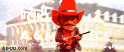 Cowboy In Red Hat Holding Gun GIF
