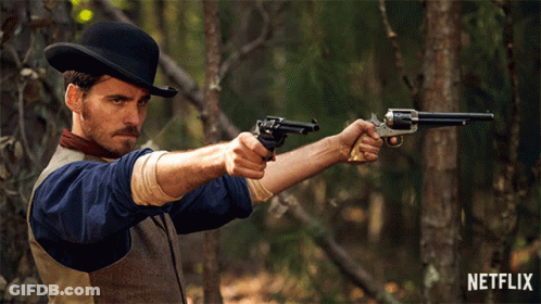 Cowboy Man Holding Guns GIF