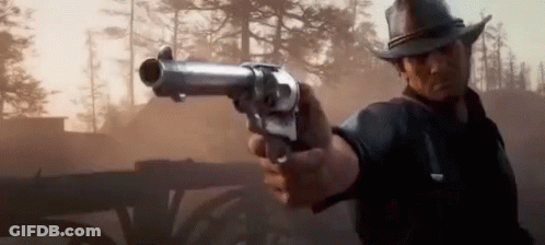 Cowboy Pointing Gun At Horse Drawn Carriage GIF