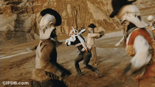 Cowboys Running In Desert With Sword GIF