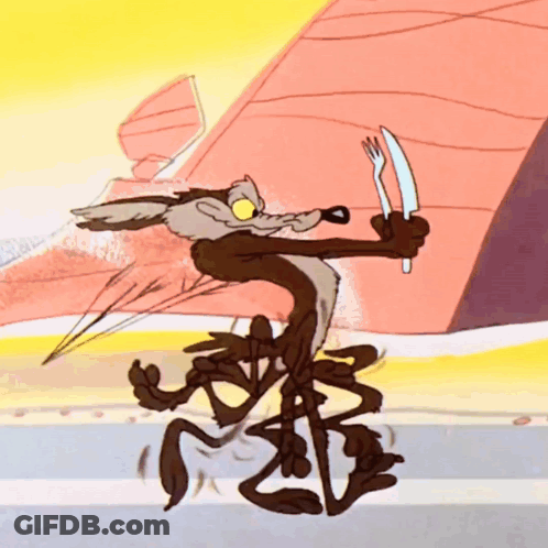 Coyote Holding Knife And Fork In Mouth GIF