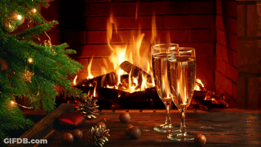 Cozy Christmas Fireplace Champagne GIF