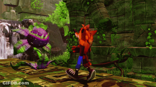 Crash Bandicoot Is Playing A Video Game With A Purple Plant In The Background GIF