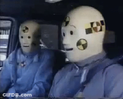 Crash Test Dummies Sitting In Car GIF