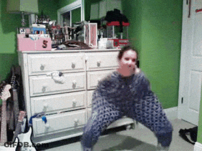 Crazy Dancing Woman Wearing Pajama Until Her Shoulders GIF