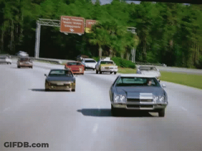 Crazy Driver And Passenger Sliding On His Seat GIF