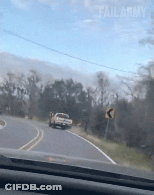 Crazy Driver Crashing Into Sign GIF
