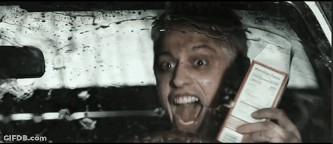 Crazy Driver Holding Box Of Milk GIF