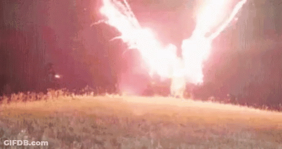 Crazy Jurassic Costume Holding Firecracker GIF
