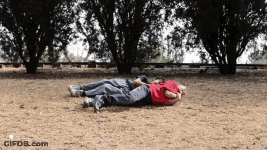 Crazy Kids Rolling On The Ground GIF