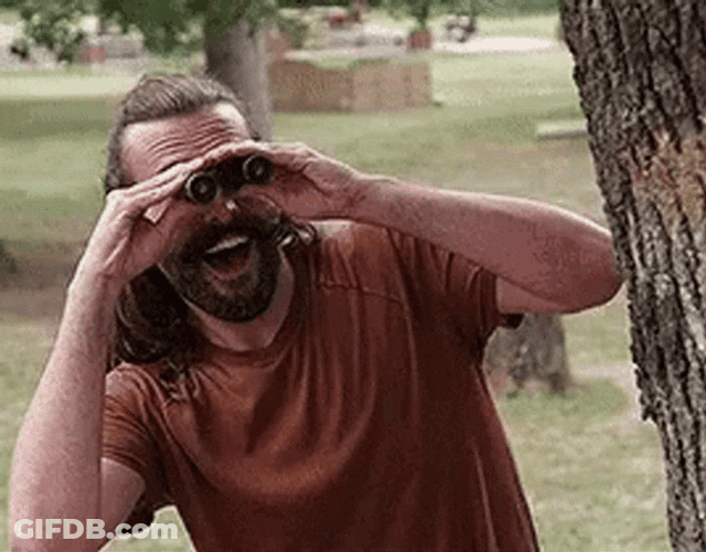 Creeper Behind Tree Using Binoculars GIF
