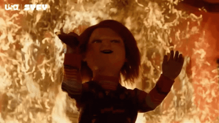 Creepy Chucky Fire Knife GIF
