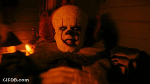 Creepy Clown With Mask GIF