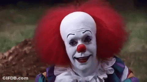 Creepy Clown With Red Hair And Red Nose GIF