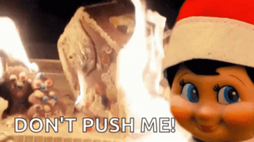 Creepy Elf On The Shelf Moving Burning Background GIF