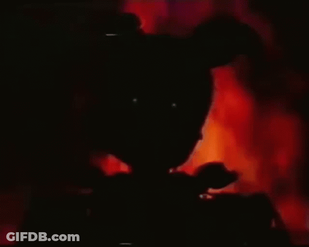 Creepy Shadow Burning In The Background GIF