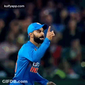 Cricket Player Giving Thumbs Up In Blue Jersey And Hat GIF