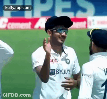 Cricket Player Giving Thumbs Up In Blue Jersey And Hat GIF