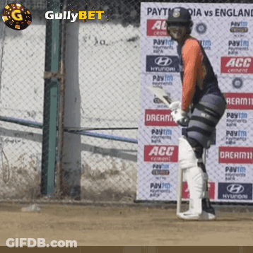 Cricket Player In Front Of Gullybet Wall GIF