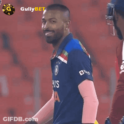 Cricket Player In Front Of Gullybet Wall GIF