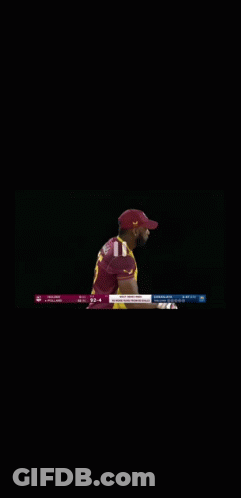 Cricket Player In Maroon And Yellow Uniform GIF