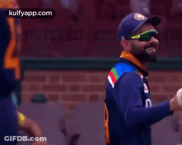 Cricket Player In Sunglasses And Blue Hat GIF