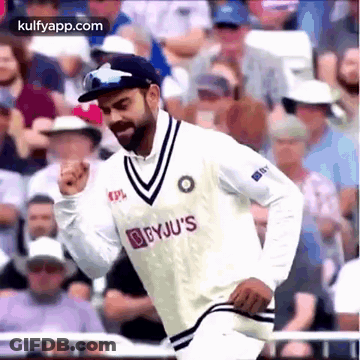 Cricket Player Running In White Jersey And Hat GIF
