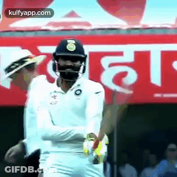Cricket Player Wearing Helmet And Mask GIF