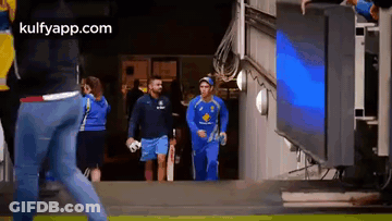Cricket Players Walking Out Of Building GIF