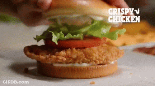 Crispy Chicken Sandwich With Lettuce And Tomato GIF