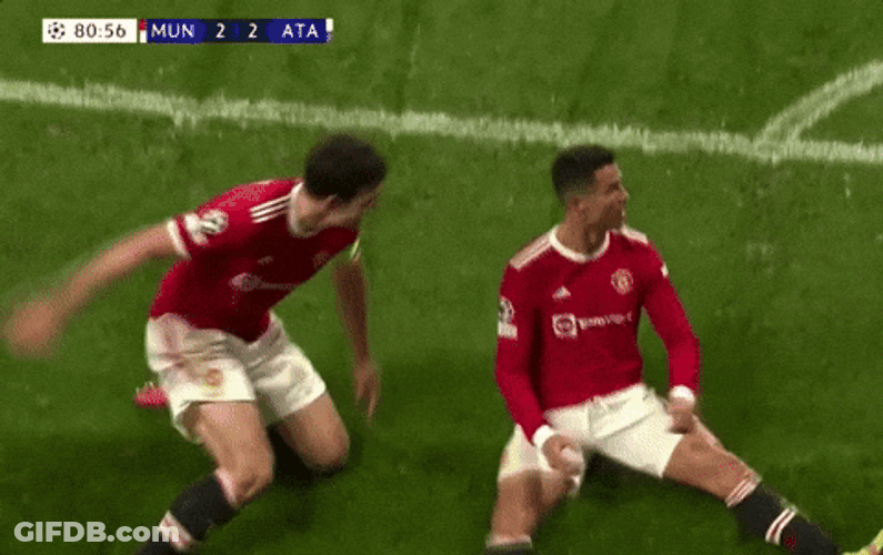 Cristiano Ronaldo Scoring A Goal Hugged By Teammates GIF