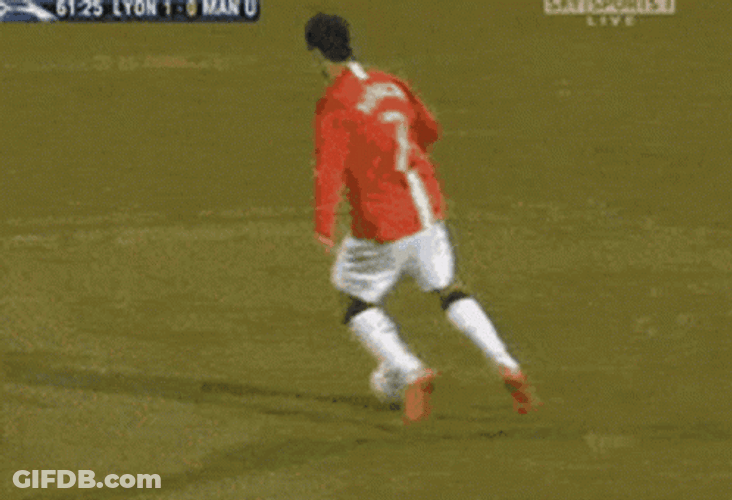 Cristiano Ronaldo Scoring A Goal Kicks Ball In Open Field GIF