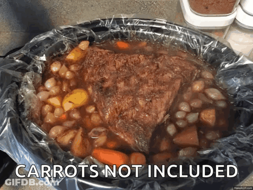 Crock Pot Filled With Carrots And Potatoes GIF