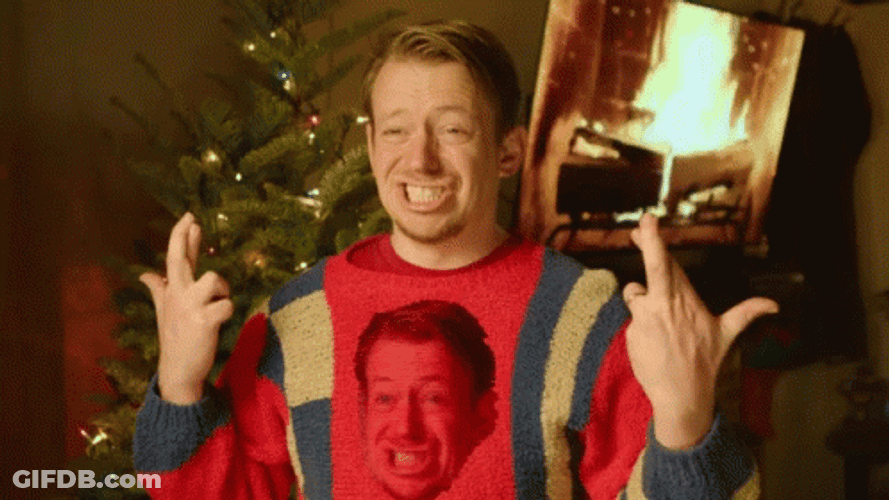 Cross Fingers Awkward Smile GIF