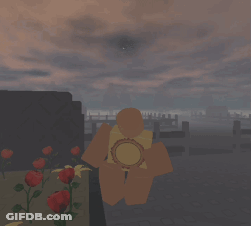 Cross In Cemetery With Roses And Cloudy Sky GIF