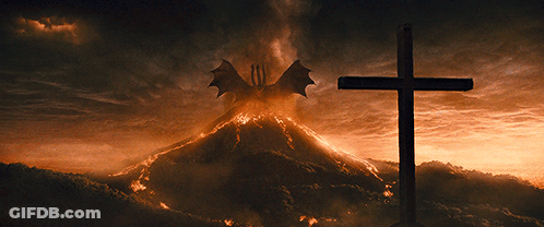 Cross In Front Of Volcano And Dragon GIF