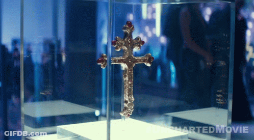 Cross In Glass Case Charted Movie GIF