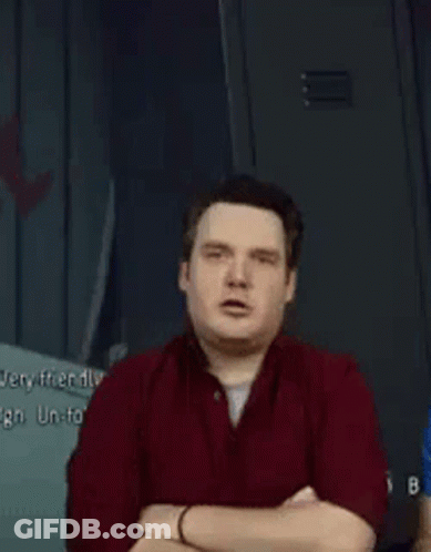 Crossed Arms Man In Red Shirt Saying Gross GIF