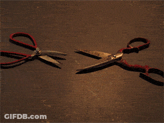 Crossed Red-Handled Scissors GIF