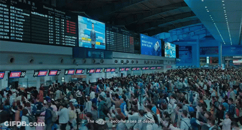 Crowd At Airport Saying City Will Become Sea Of Death GIF