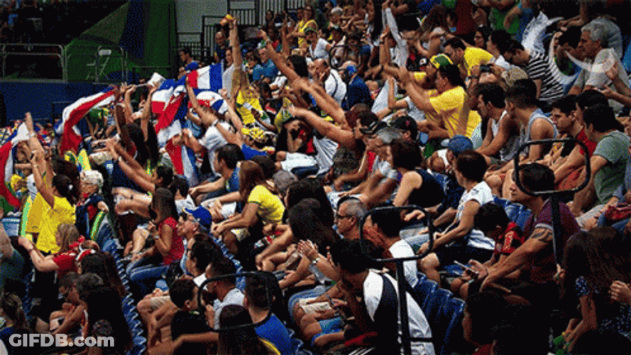 Crowd Cheering And Waving Hands Up GIF