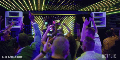 Crowd Dancing At Party With Netflix Logo GIF