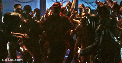 Crowd Dancing In Dark Room With Chains GIF