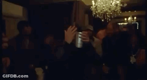 Crowd Dancing In Dark Room With Chandelier GIF