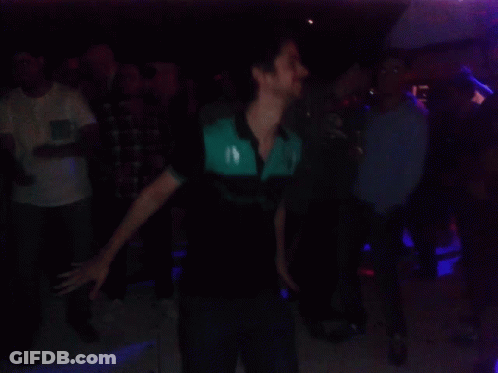 Crowd Dancing In Dark Room With Green Lights GIF